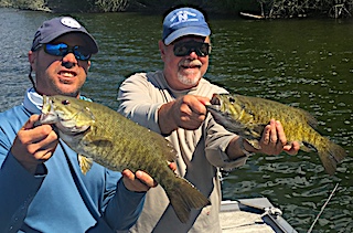 Big Smallmouth Bass Doubles by Stu and Jason Fishing at Fireside Lodge in Canada  